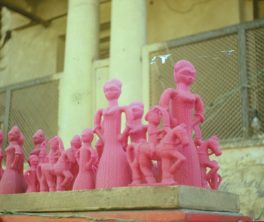 Epic heroes carved in pink sugar candy.