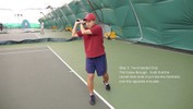 The left hand stays on the racket all the way through the stroke, pulling the racket back over the right shoulder.
