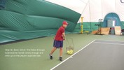 At the end of the stroke, the racket has wrapped around the left side of the body at hip-level.