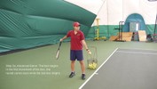 The left hand brings the ball down while the right hand swings the racket back.