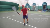 Leaning on the right foot, the racket swings around to the back, staying perpendicular to the arm, stopping less than halfway.