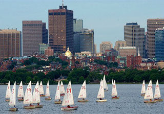A photograph of sailboats on the Charles River.