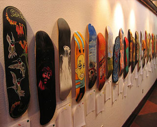 Silent auction of skateboard boards.