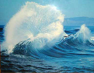 Photograph of waves breaking in the ocean.