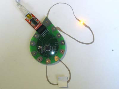 Photo showing the LED lit up when the paper switch is closed.