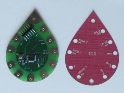 Photo showing the front and back sides of the teardrop Arduino circuit board.