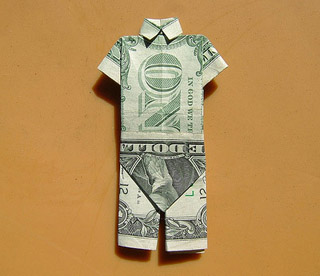 Origami: dollar bills folded up in the shape of full suit.