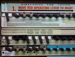 Image depicts a lever-operated voting machine used in 2008 U.S. presidential elections.