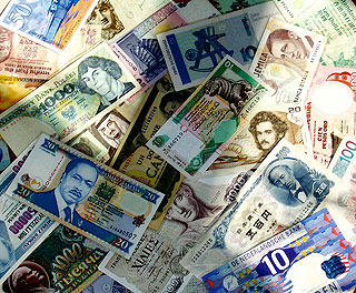 A collage of currency from countries around the world.